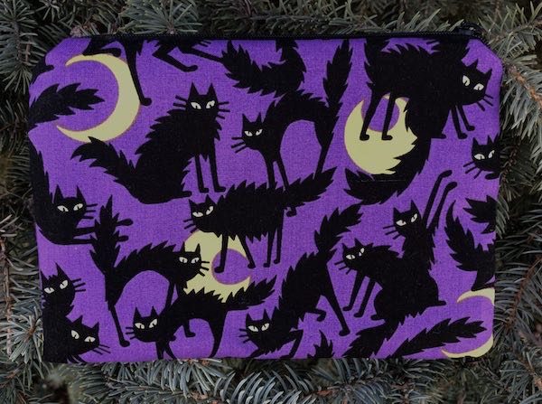black cats moons on purple zippered makeup bag