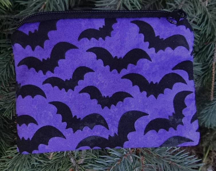 bats on purple coin purse
