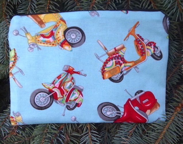 Scooters on blue zippered bag