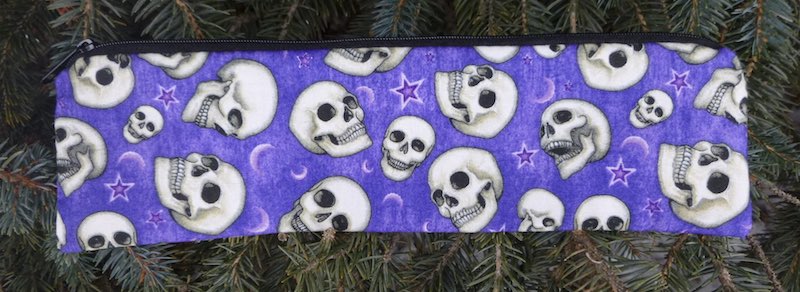 Skulls on purple pouch for paper straws and reusable straws eco friendly