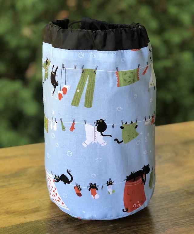 Clothes on the Line SueBee Round Drawstring Bag