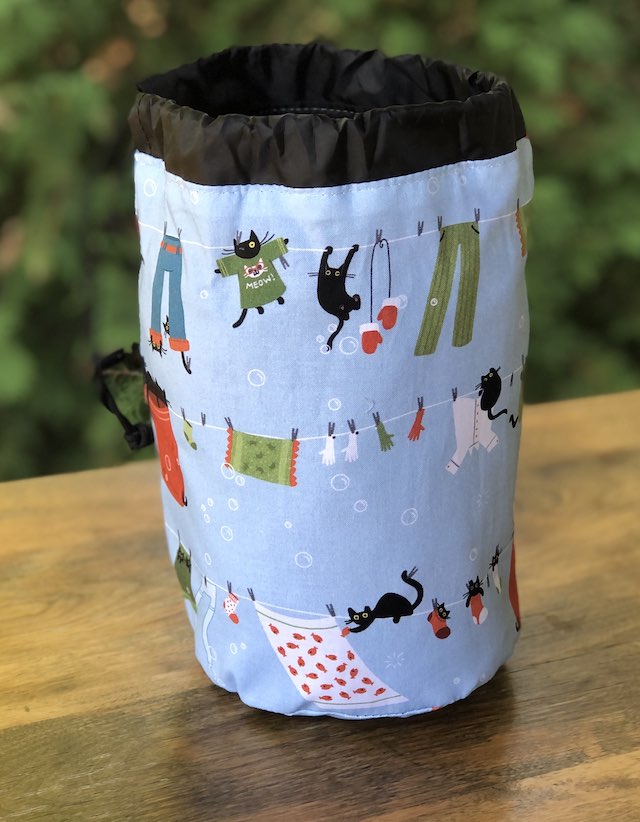 Clothes on the Line SueBee Round Drawstring Bag