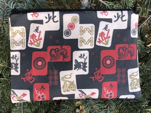Mahjong Tiles on red zippered bag, The Scooter