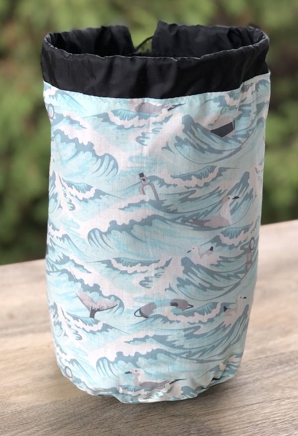 Tula Pink's Sea Debris SueBee Round Drawstring Bag