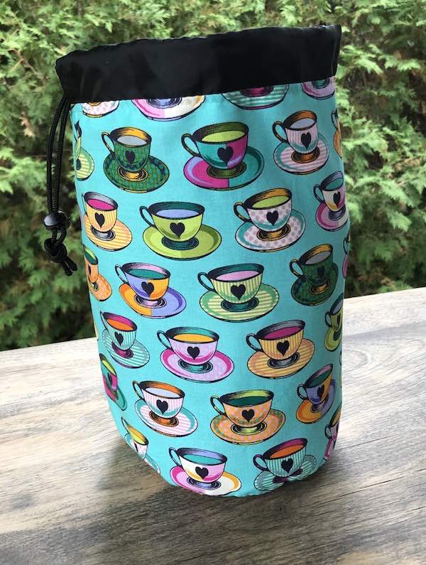 Tea Time SueBee Round Drawstring Bag, Curiouser and Curiouser