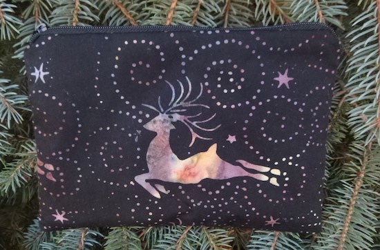 Reindeer on black batik zippered bag, The Scooter