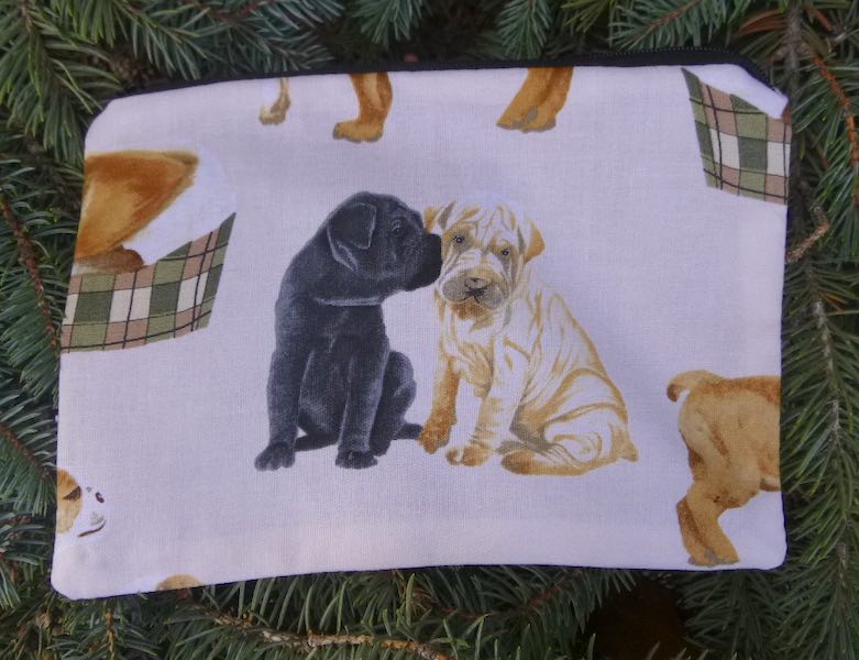 Bulldogs on cream zippered bag, The Scooter