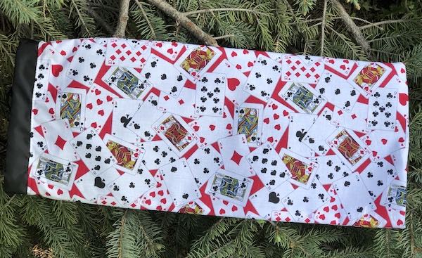 Cards on red drawstring bag for canasta racks and card spinner, Rummikub racks and tiles,  the Racker Jr