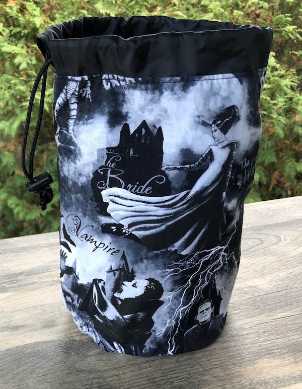 Monsters in Black and White SueBee Round Drawstring Bag
