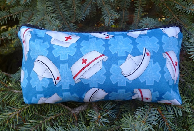 Nurses caps on blue flat bottom bag, The Zini