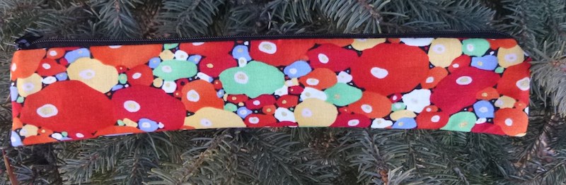 Red Bubbles low profile case to carry a reusable straw, The Skinny Strawz